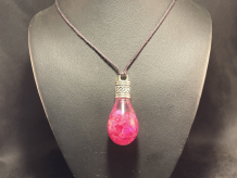 Ruby UV reactive Globe Amulet
